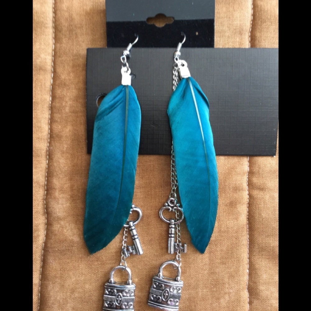 Real feather earrings, new